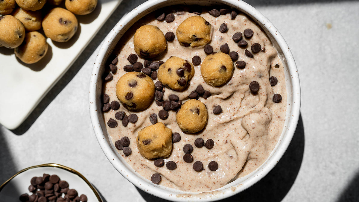 Cookie dough protein smoothie bowl with cookie dough balls and chocolate chips