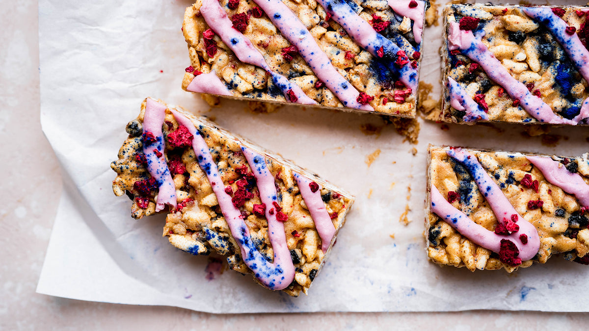 Peanut butter and berry protein crunch bars with raspberry glaze