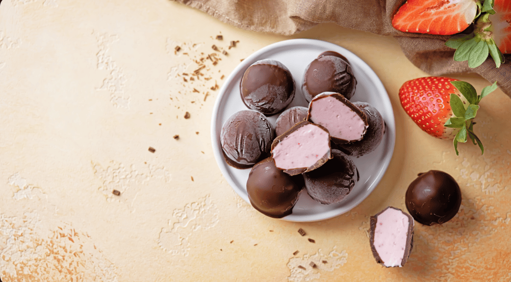 Frozen strawberry Greek yogurt bites dipped in dark chocolate
