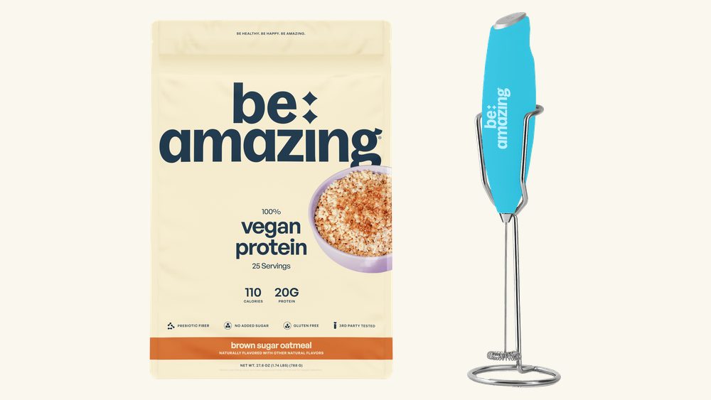 A bag of vegan protein beside the free handheld mixer